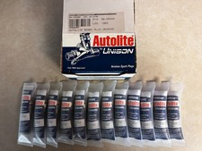 12 New Unopened Unison Autolite